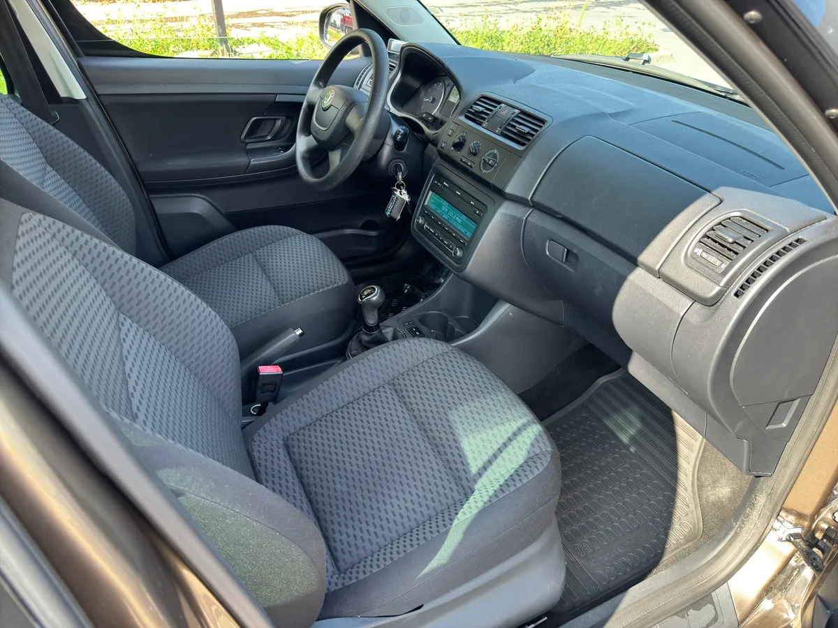 Skoda Roomster 1.4 MT (86 л.с.) Ambition