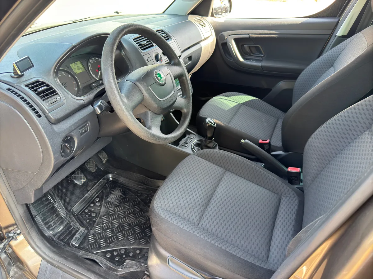 Skoda Roomster 1.4 MT (86 л.с.) Ambition